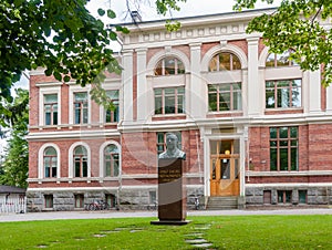 Mixed school formed Real Lyceum and bust of Eino Sakari YrjÃ¶-Koskinen in Pyynikki Church Park, Tampere, Finland