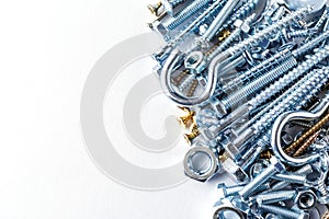 Mixed screws and nails. Industrial background. Home improvement.bolts and nuts.Close-up of various screws. Use for background, top