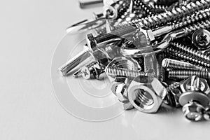 Mixed screws and nails. Industrial background. Home improvement.bolts and nuts.Close-up of various screws. Use for background, top