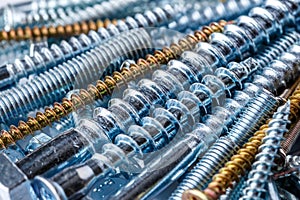 Mixed screws and nails. Industrial background. Home improvement.bolts and nuts.Close-up of various screws. Use for background, top