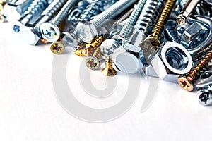 Mixed screws and nails. Industrial background. Home improvement.bolts and nuts.Close-up of various screws. Use for background, top