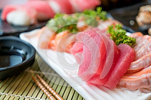 Mixed sliced fish sashimi in white plate. Sashimi Salmon and Tun