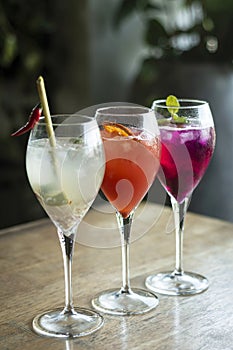 Mixed spritzer wine cocktails selection with fruit in outdoor bar