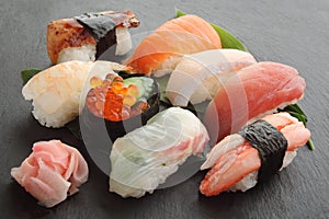 Mixed Sushi Platter on black stone plate, Japanese Food photo