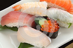 Mixed Sushi Platter on white plate, Japanese Food photo