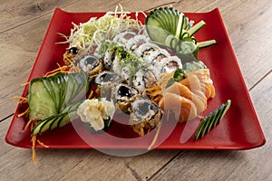 Mixed sushi roll and salmon sashimi