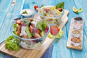 Mixed Vegetable Salads on Blue Wood Background - Mixed Gourmet Food , Mixed Healthy Food - Chicken Salad / Cheese Salad - Green