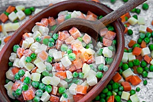 Mixed vegetables in a clay bowl