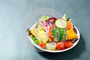 Mixed vegetables salad on white dish