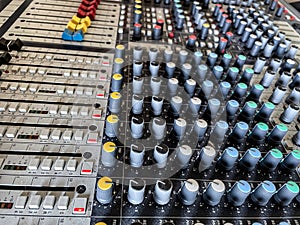 Mixer control. Music engineer. Backstage controls on an audio mixer, Sound mixer. Professional audio mixing console with lights,