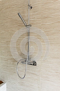 Mixer tap shower with adjustable wand