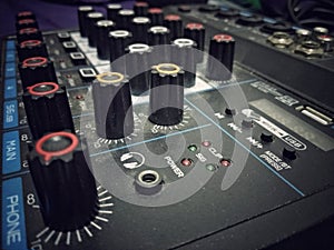 Mixer to unify the sound of several musical instruments and vocals photo