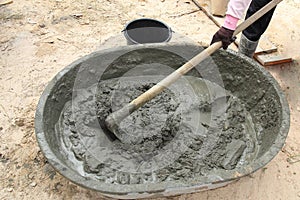 Mixing a cement in salver photo