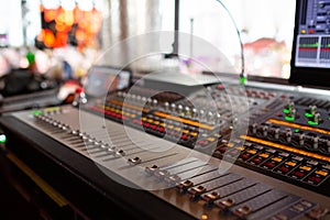 Mixing console of light equipment operator at the concert. Sound recording studio mixing desk with engineer or music