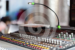 Mixing console of light equipment operator at the concert. Sound recording studio mixing desk with engineer or music