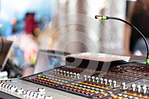 Mixing console of light equipment operator at the concert. Sound recording studio mixing desk with engineer or music