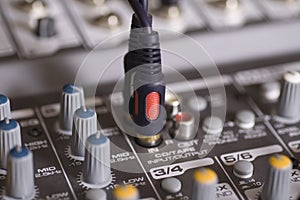 Mixing console with wires plugged in