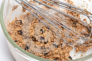 Mixing ingredients to prepare integral wheat bran muffins