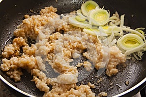 Mixing rice with soy sauce