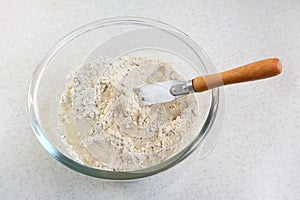 Mixing water and bread flour mix