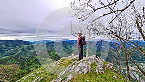 Mixnitz - Man enjoying the view from mount Roethelstein in Styria, Austria. Bushland and Hills photo