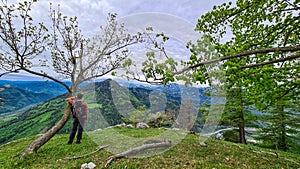 Mixnitz - Man enjoying the view from mount Roethelstein in Styria, Austria. Bushland and Hills photo