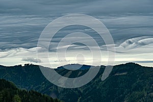 Mixnitz - Strange clouds and view from mount Roethelstein in Styria, Austria. Bushland and Hills