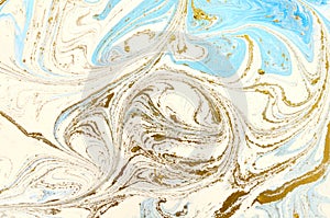 Mixture of acrylic paints. Modern artwork with spots and splashes of color paint. Liquid marble texture. Applicable for design.