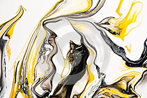 Mixture of acrylic paints. Modern artwork. Yellow and black mixed acrylic paints. Liquid marble texture. Applicable for