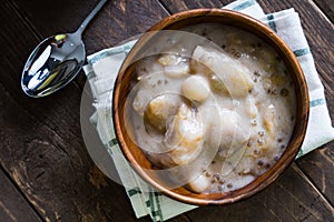 Mixture of banana, taro, pumpkin, rice balls and sago in coconut milk