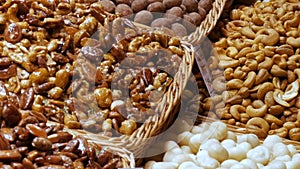 Mixture of dates dry fruits Raisins and nuts in the market La Boqueria in Barcelona,Spain