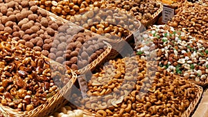 Mixture of dates dry fruits Raisins and nuts in the market La Boqueria in Barcelona,Spain