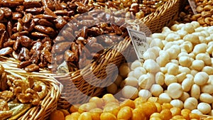 Mixture of dates dry fruits Raisins and nuts in the market La Boqueria in Barcelona,Spain