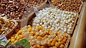 Mixture of dates dry fruits Raisins and nuts in the market La Boqueria in Barcelona,Spain