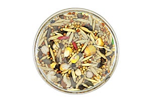 A mixture of grains and cereals in a glass cup