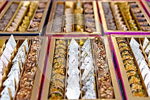 A mixture of various Indian sweets packed in a box. Peda, laddu, mithai, diwali sweets