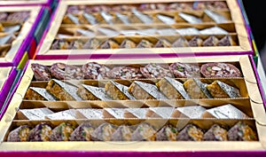 A mixture of various Indian sweets packed in a box. Peda, laddu, mithai, diwali sweets