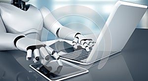 MLB Robot humanoid use laptop and sit at table in future office