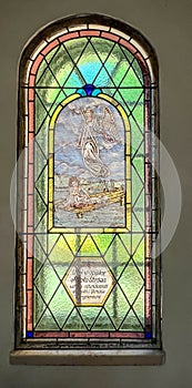 Stained glass in the window of the Church of Saint Michael the Archangel in MÃâochÃÂ³w, showing