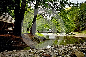 Mlyny - Oblazy Kvacianska valley in Slovakia. Bridge over water with reflection on the mountain stream.