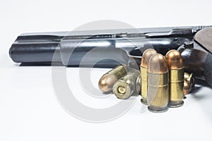 11 mm. Black handgun And ammunition