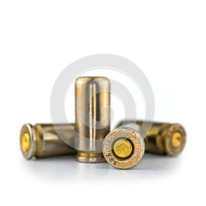 9mm bullets isolated on white background, close-up view, ammo for a gun