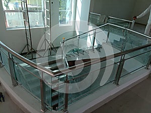 12mm toughened glass in SS railings Indian photo