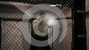 MMA fighter man trains with kickboxing in the gym. Close up view