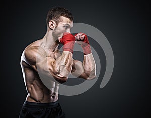 MMA Fighter Preparing Bandages For Training.