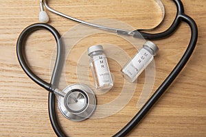 MMR vials with a stethoscope photo