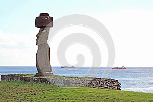 The Moai with Pukao Hat of Ahu Ko Te Riku Ceremonial Platform, with Pacific Ocean in the Backdrop,, Easter Island, Chile photo