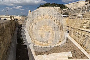 Moat and battlements Valletta fortress, Malta