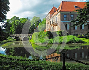 Castle, moat and bridge.