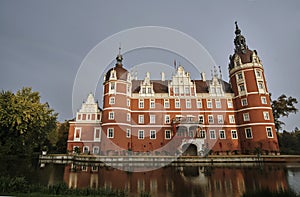 Moat and New Castle in the park Muskauer